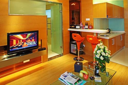 Imagen de la habitación del Hotel Ming Guang International Grand Hotel Haikou. Foto 6