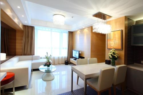 Imagen de la habitación del Hotel Ming Guang International Grand Hotel Haikou. Foto 10