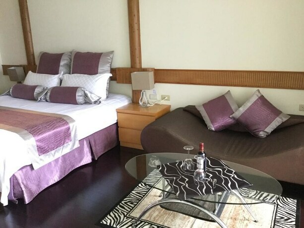 Imagen de la habitación del Hotel Ming Hu Bandb (no Elevator). Foto 6