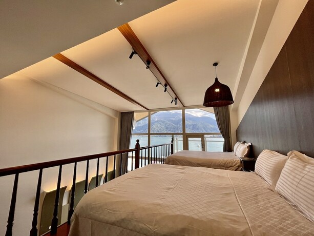Imagen de la habitación del Hotel Ming Hu Bandb (no Elevator). Foto 8