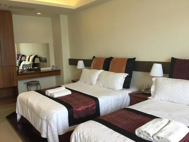 Imagen de la habitación del Hotel Ming Hu Bandb (no Elevator). Foto 9