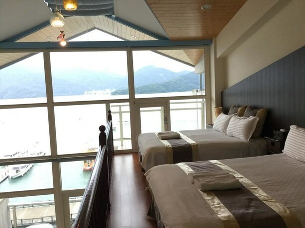 Imagen de la habitación del Hotel Ming Hu Bandb (no Elevator). Foto 10
