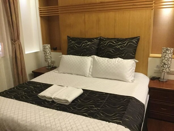 Imagen de la habitación del Hotel Ming Hu Bandb (no Elevator). Foto 12