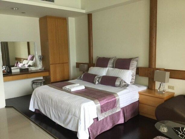 Imagen de la habitación del Hotel Ming Hu Bandb (no Elevator). Foto 13