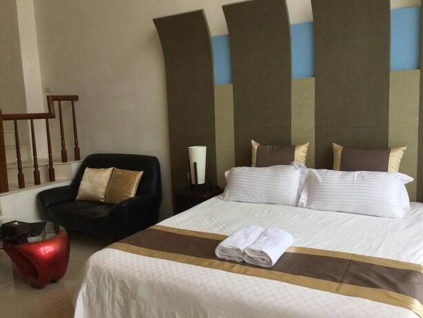 Imagen de la habitación del Hotel Ming Hu Bandb (no Elevator). Foto 14