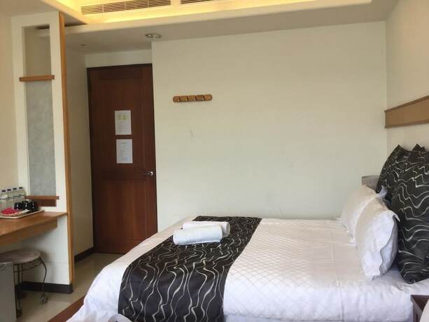 Imagen de la habitación del Hotel Ming Hu Bandb (no Elevator). Foto 16