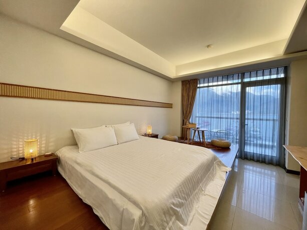 Imagen de la habitación del Hotel Ming Hu Bandb (no Elevator). Foto 18
