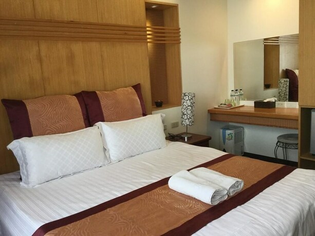 Imagen de la habitación del Hotel Ming Hu Bandb (no Elevator). Foto 19