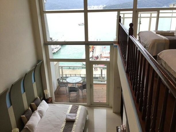Imagen de la habitación del Hotel Ming Hu Bandb (no Elevator). Foto 22