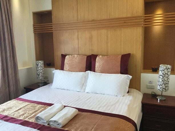 Imagen de la habitación del Hotel Ming Hu Bandb (no Elevator). Foto 24