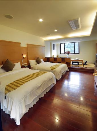 Imagen de la habitación del Hotel Ming Lu Holiday. Foto 4