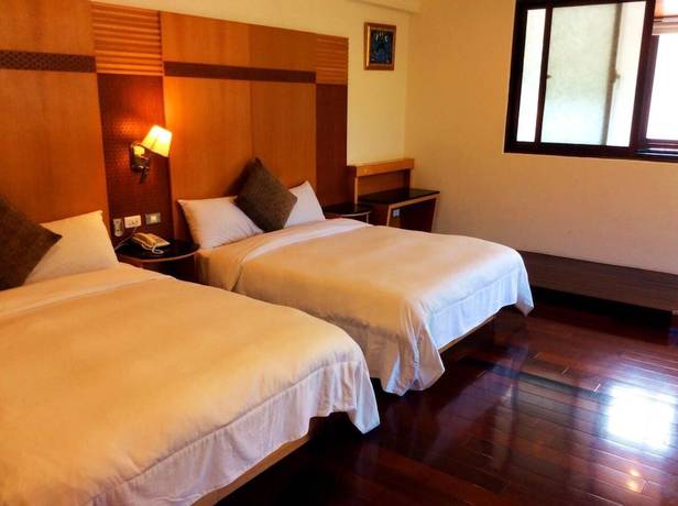 Imagen de la habitación del Hotel Ming Lu Holiday. Foto 7
