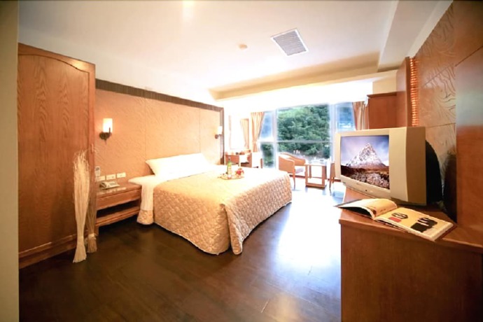 Imagen de la habitación del Hotel Ming Lu Holiday. Foto 10
