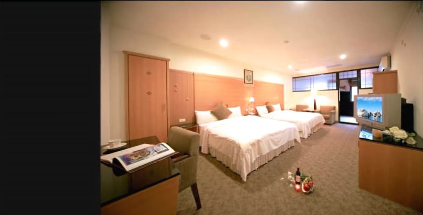 Imagen de la habitación del Hotel Ming Lu Holiday. Foto 12