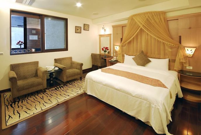 Imagen de la habitación del Hotel Ming Lu Holiday. Foto 15