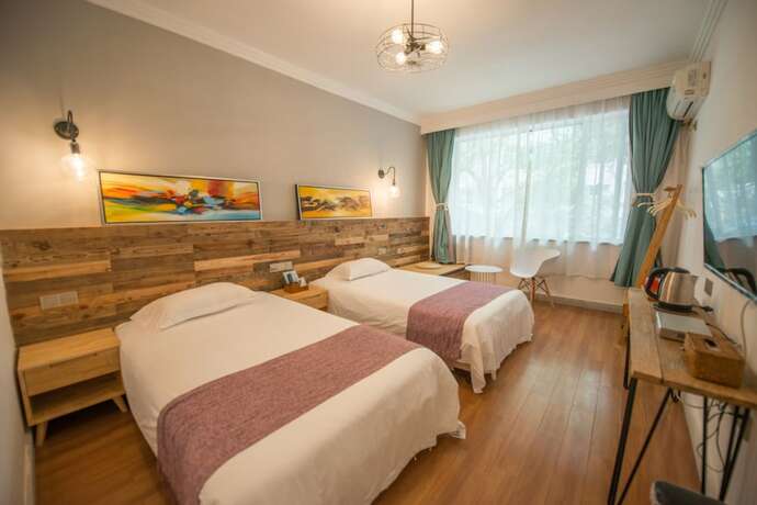 Imagen de la habitación del Hotel Ming Palace Inn. Foto 11
