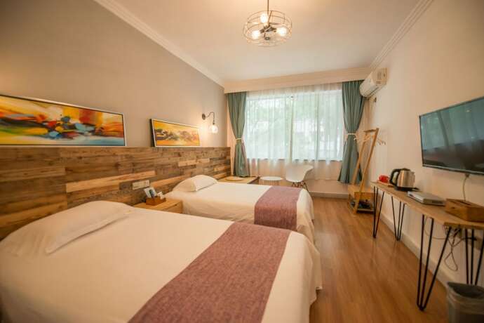 Imagen de la habitación del Hotel Ming Palace Inn. Foto 19