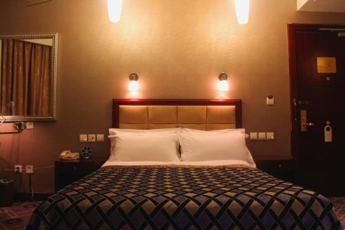 Imagen de la habitación del Hotel Ming Ren Grand Hotel. Foto 6