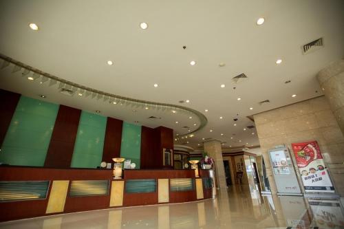 Imagen de la habitación del Hotel Ming Ren Grand Hotel. Foto 10