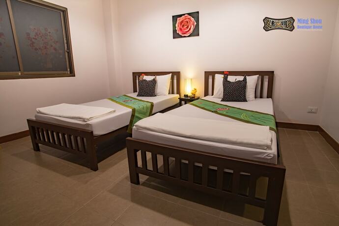 Imagen de la habitación del Hotel Ming Shou Boutique House. Foto 17