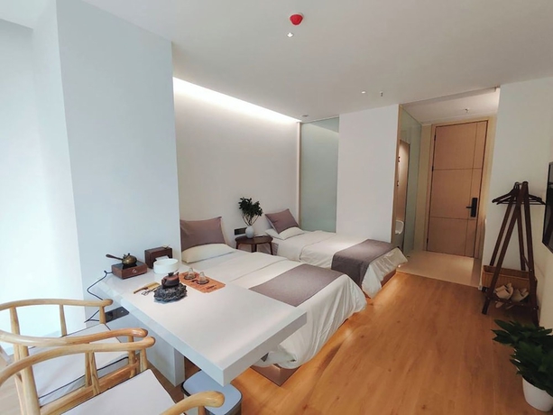 Imagen de la habitación del Hotel MingShanshui Shiguang Homestay. Foto 4