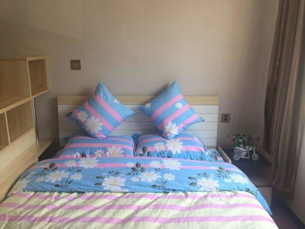 Imagen general del Hotel MingShiYuan Private apartment. Foto 11