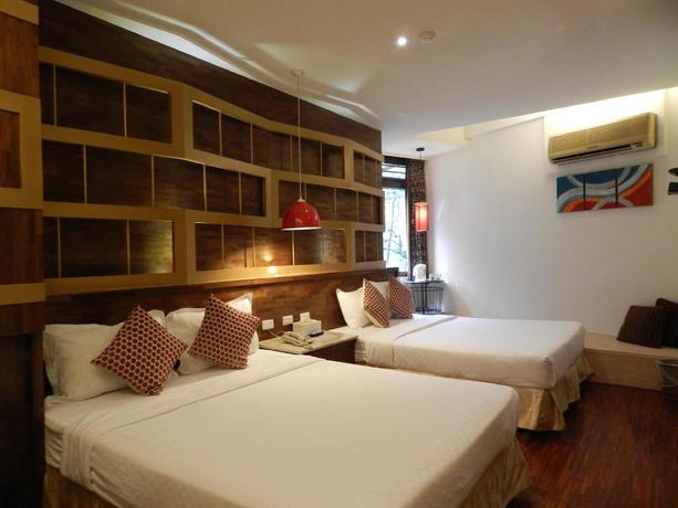 Imagen de la habitación del Hotel Mingao Spring. Foto 7