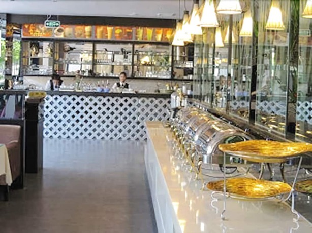 Imagen de la habitación del Hotel Mingdian Business Hotel - Xiamen. Foto 2