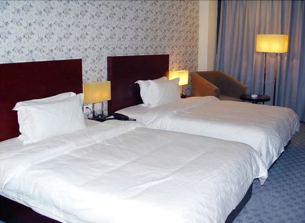 Imagen de la habitación del Hotel Mingdian Business Hotel - Xiamen. Foto 5