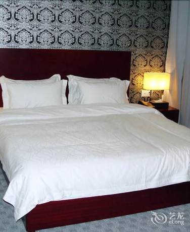 Imagen de la habitación del Hotel Mingdian Business Hotel - Xiamen. Foto 9