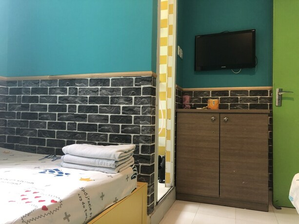 Imagen de la habitación del Hotel Mingdou. Foto 4