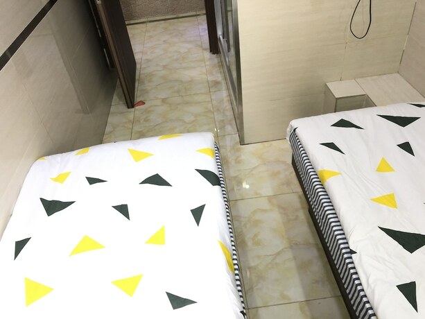 Imagen de la habitación del Hotel Mingdou. Foto 14