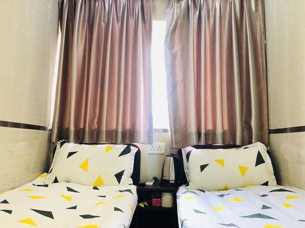 Imagen de la habitación del Hotel Mingdu Hostel. Foto 6