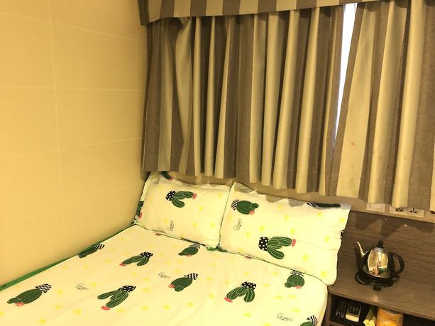 Imagen de la habitación del Hotel Mingdu Hostel. Foto 9