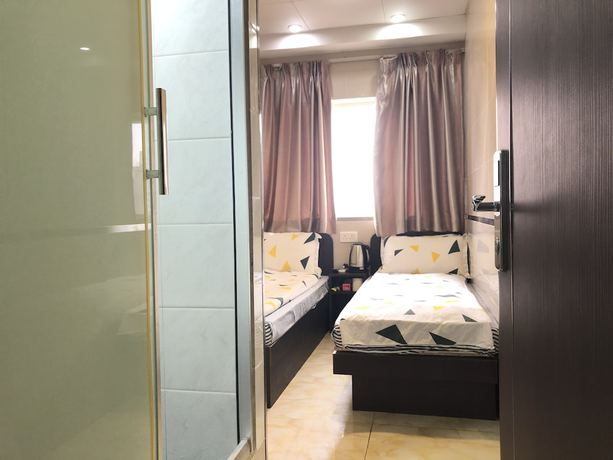 Imagen de la habitación del Hotel Mingdu Hostel. Foto 11
