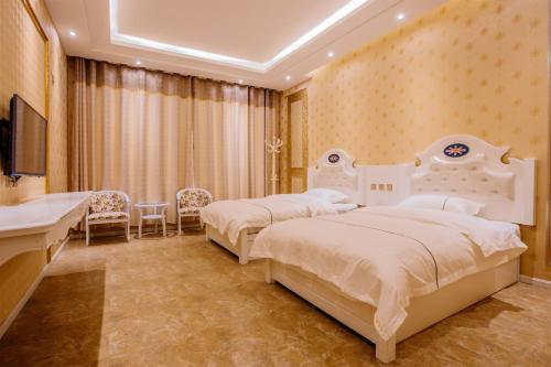 Imagen de la habitación del Hotel Mingdu Hotel. Foto 5