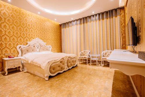 Imagen de la habitación del Hotel Mingdu Hotel. Foto 7