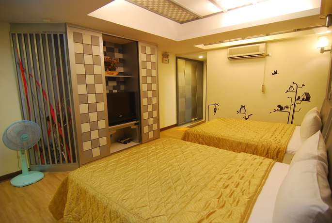 Imagen de la habitación del Hotel Ming-jun Holiday Inn. Foto 17