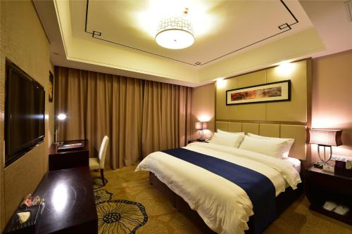 Imagen de la habitación del Hotel Mingren. Foto 6