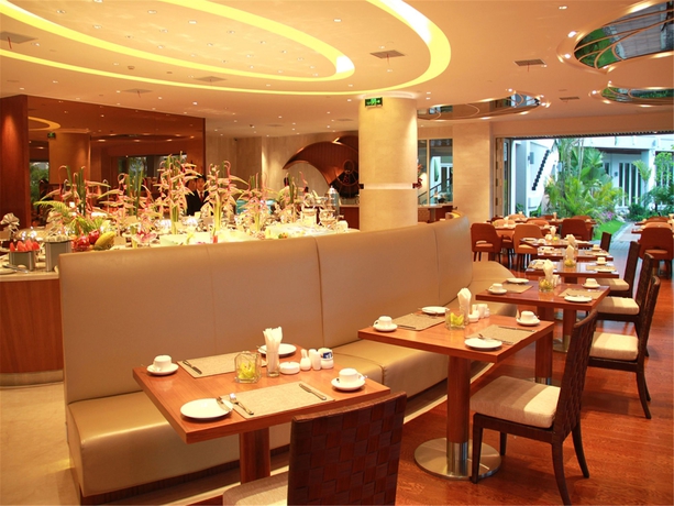 Imagen del bar/restaurante del Hotel Mingshen Golf and Bay Resort Sanya. Foto 6