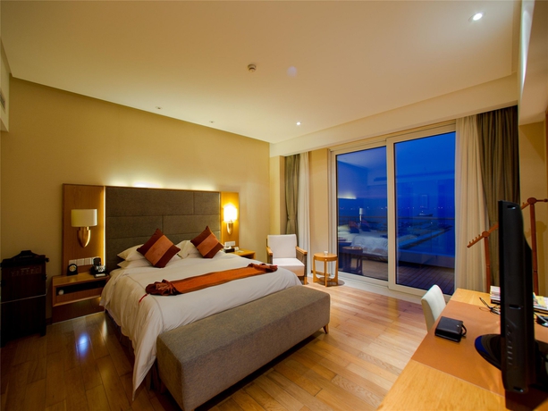 Imagen de la habitación del Hotel Mingshen Golf and Bay Resort Sanya. Foto 10