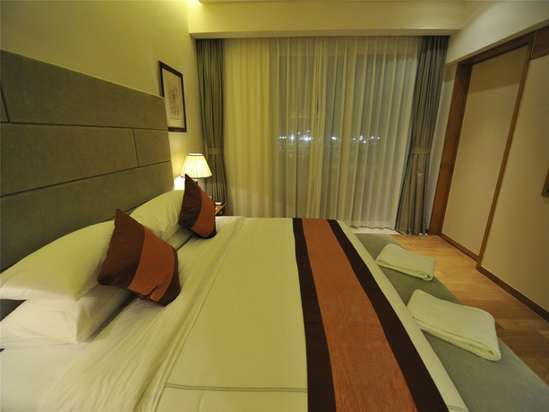Imagen de la habitación del Hotel Mingshen Golf and Bay Resort Sanya. Foto 11
