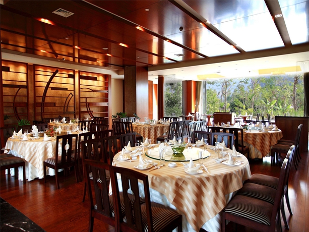 Imagen del bar/restaurante del Hotel Mingshen Golf and Bay Resort Sanya. Foto 7