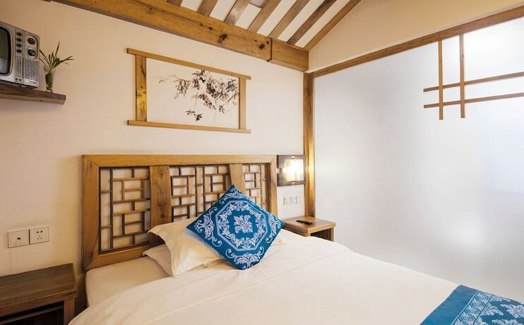 Imagen de la habitación del Hotel Minguo Life Zhangjiajie. Foto 17