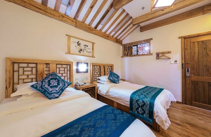 Imagen de la habitación del Hotel Minguo Life Zhangjiajie. Foto 22