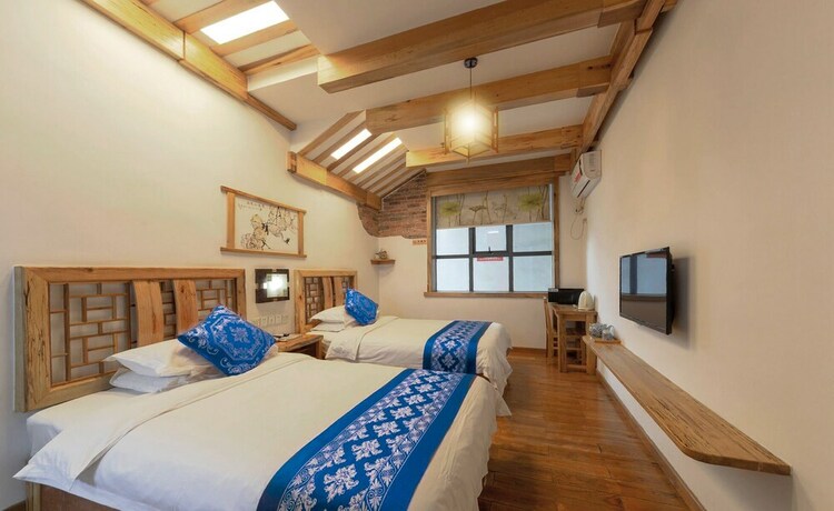 Imagen de la habitación del Hotel Minguo Life Zhangjiajie. Foto 23