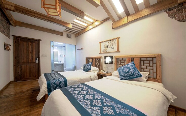 Imagen de la habitación del Hotel Minguo Life Zhangjiajie. Foto 24