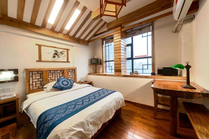 Imagen de la habitación del Hotel Minguo Life Zhangjiajie. Foto 25