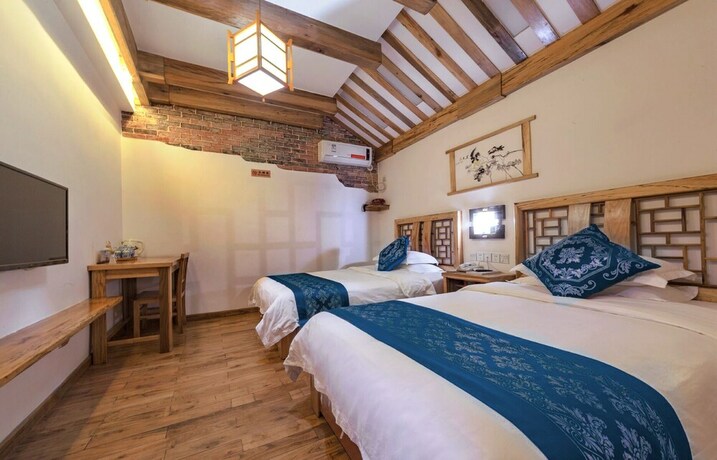 Imagen de la habitación del Hotel Minguo Life Zhangjiajie. Foto 28