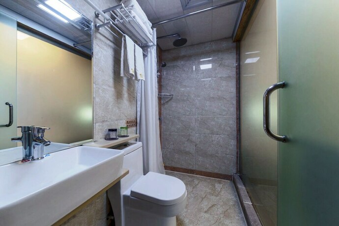 Imagen de la habitación del Hotel Minguo Life Zhangjiajie. Foto 32